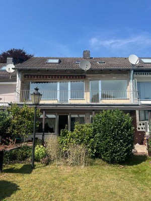 Außergewöhnlich breites Reihenhaus mit Südgrundstück und Pflegebedarf
