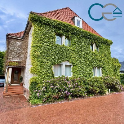 Zweifamilienhaus mit einer Praxis, einer Wohneinheit und einem idyllischen Garten in Stolzenau!