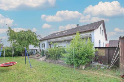 Familienfreundliches Zweifamilienhaus mit großem Garten in Sassanfahrt – ideal für Ihre Familie