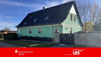 Zweifamilienhaus auf großem Grundstück!