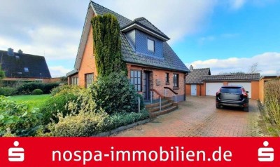 Modernisierungsbedürftiges Wohnhaus mit Teilkeller, Doppelgarage, Carport und Gartenhaus