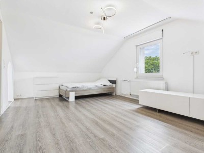 Charmante 2-Zimmer-DG-Wohnung mit Einbauküche und Stellplatz in ruhiger Lage von Münster (Hessen)