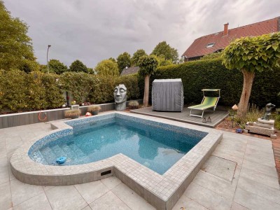 Exclusive Hochparterre-Wohnung in moderner Architektur mit Wohlfühlambiente