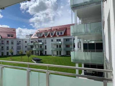 Neuwertige Wohnung mit dreieinhalb Zimmern sowie Balkon und EBK in Baiersdorf