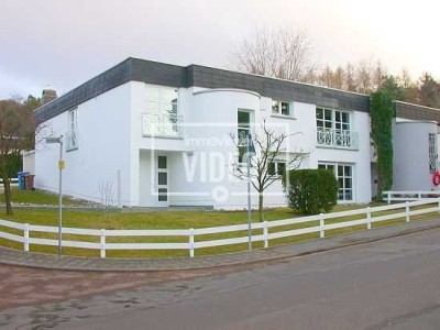 Representative home with a garage - view over the valley