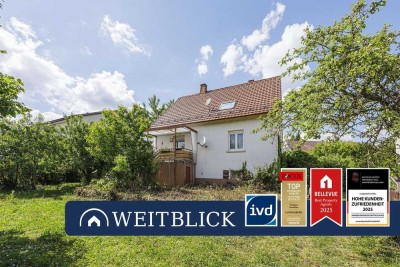 WEITBLICK: Zweifamilienhaus mit Traumgrundstück!