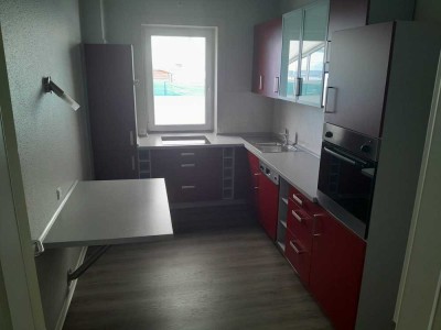 Freundliche und modernisierte 5-Zimmer-Erdgeschosswohnung mit Balkon