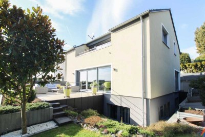 Architektonisches Juwel mit Einliegerwohnung – Exklusives Wohnen in Bestlage für Ihre Familie !