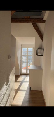 Einzigartiger Charme im Denkmal – helle DG-Wohnung mit Traumterrasse in Kollnau