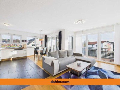 Komfort & Aussicht vereint: Helle, vermietete 3-Zi.-Wohnung mit Sonnenloggia in ruhiger Dorfrandlage