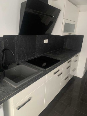 Sanierte Immobilie mit Garten, Garage und Erweiterungsmöglichkeiten