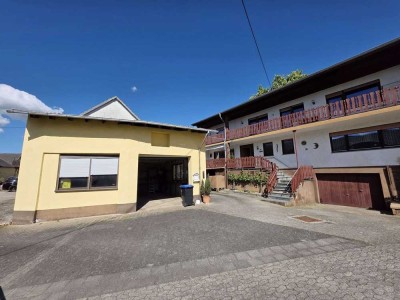 Warmsroth - Großzügiges Einfamilienhaus mit Scheune in ruhiger und zentraler Lage!