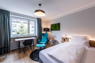 Modern möblierte 2-Zimmer-Business Wohnung mit Balkon und separater Küche