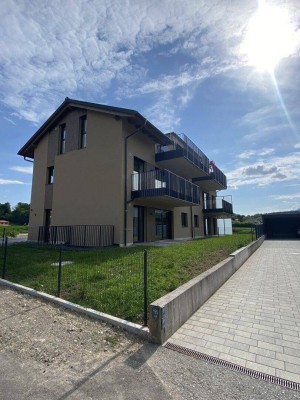 Idyllische 3,5-Zimmer-Wohnung mit Garten - Erstbezug