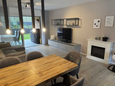 Barrierefreie 3,5-Zimmer-Wohnung im EG mit privatem Garten, Tiefgarage, Aufzug