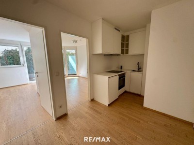 Moderne, neuwertige 2-Zimmer-Wohnung mit Terrasse und Garten