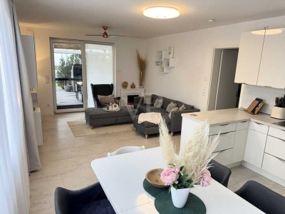 Exklusives Wohnen mit Hafenflair - gehobene Eigentumswohnung mit Terrasse & Garten direkt am See