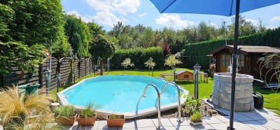 Ein- bis Zweifamilienhaus mit schönem Garten und Pool!