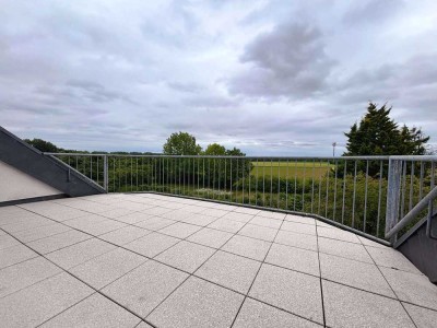 Sonnige Dachgeschoss-Maisonette mit Weitblick und Kamin