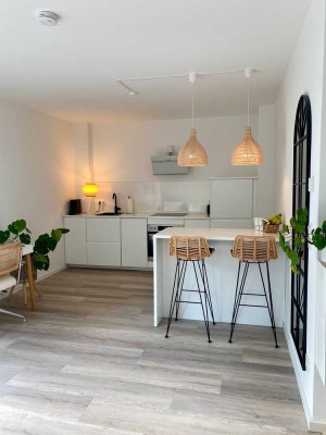 NEUBAU KR-Verberg: Exklusive Single-Gartenwohnung, 2 Zimmer, Aufzug, Wärmep. & KFW 55, TG