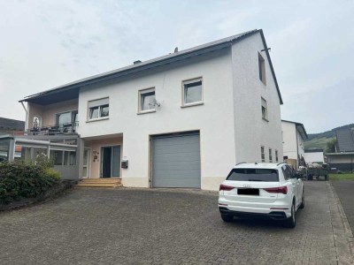 Zwei eigenständige Immobilien in Kröv:Wohn- und Geschäftshaus und Wohnhaus, jeweils mit Garage