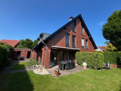 Architektenhaus mit Charakter – puristische Klarheit, lichtdurchflutete Räume & höchste Wohnqualität