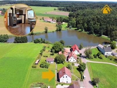 Großzügiges Dreifamilienhaus – Wohnen in idyllischer Lage am Völkerweiher