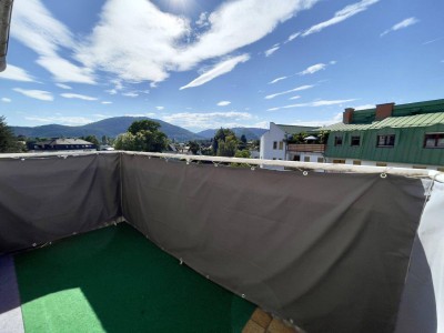 Hofseitige Wohlfühloase mit Balkon &amp; Bergblick – ruhig gelegen, zentral erreichbar!