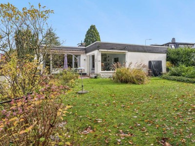 Attraktiver Bungalow in Kelkheim – gepflegte Immobilie mit Garten, Garage und soliden Mietern