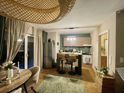 Helle Erdgeschosswohnung mit Südterrasse, Aufzug und TG-Platz