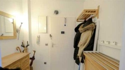 3-Zimmer-EG-Wohnung mit gehobener Innenausstattung mit Einbauküche plus Tiefgaragen Stellplatz