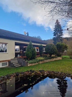 Einfamilienhaus mit idyllischem Gartenteich und Erweiterungspotenzial