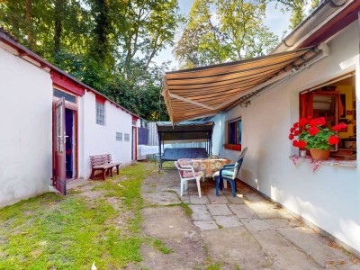 Idyllischer Bungalow am Park: Ruheoase im Grünen