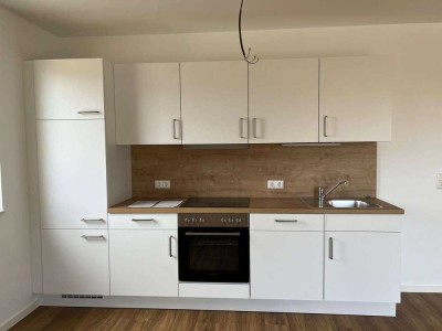 Neubauwohnung mit Einbauküche und Terrasse – WBS erforderlich!