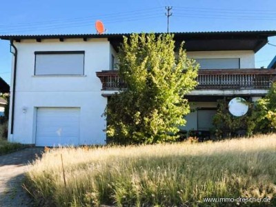 Gepflegtes freistehendes Einfamilienhaus mit viel Platz für die Familie mit Garage und Garten.