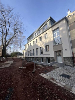 Erstbezug mit Balkon: Stilvolle 4-Raum-Hochparterre-Wohnung mit geh. Innenausstattung in Chemnitz