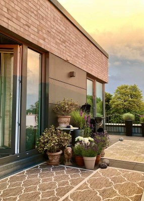 Familienfreundliches Penthouse mit Dachterrasse in ruhiger grüner Lage