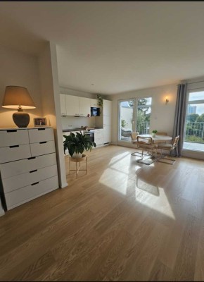 Moderne 2 Zimmer-Wohnung mit Ost u. West Dachterrassen