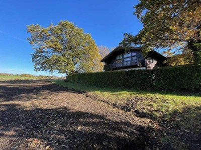 Starnberg-Pöcking: Zweifamilienhaus in naturverbundener Wohnlage mit Weitblick