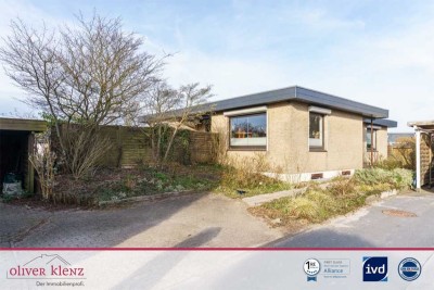 Wohnen oder investieren - vielseitiger Bungalow mit Vollkeller in begehrter Lage