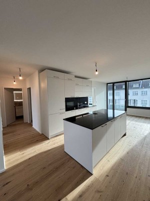 Erstbezug  Neubau: attraktive 4-Zimmer-Wohnung mit EBK und 2 Balkons - befristet bis Sommer 2029