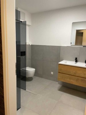 Barrierefreie 3-Zimmer-Neubauwohnung mit Garten, Terrasse & Tiefgaragenstellplatz – KfW 55 Standard