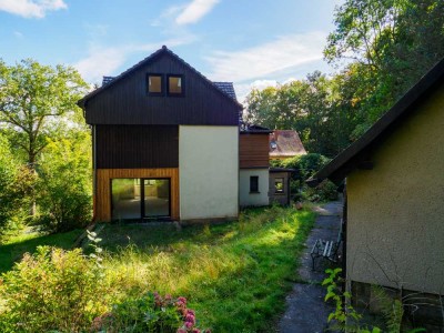 EINFAMILIENHAUS MIT WÄRMEPUMPE, SOLARTHERMIE, VORB.  FUßBODENHEIZUNG, GARAGE, STELLPLÄTZEN,
