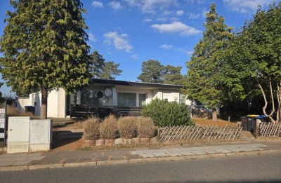 Gepflegte Wohnanlage mit vier vermieteten - ebenerdigen Wohneinheiten und zwei Garagen