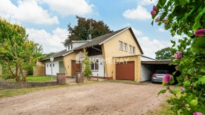 Familienfreundliches Zuhause mit 6 Zimmern und  schönem Garten in bester Lage