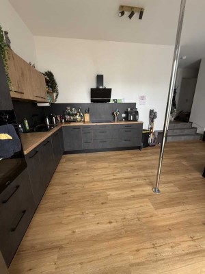Helle 2-Zimmer-Wohnung mit eigenem Garten & Tiefgarage