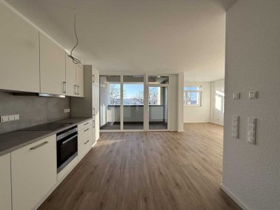 Penthouse in Bahnhofsnähe, Wohnung 26, Erstbezug: 2-Zimmer-Wohnung, Einbauküche und Loggia