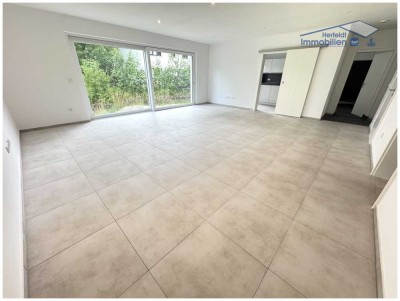 Neubau-Erstbezug! Große 2-Zimmer-EG-Wohnung mit sehr geräumigen Garten & Niedrigenergiestandard