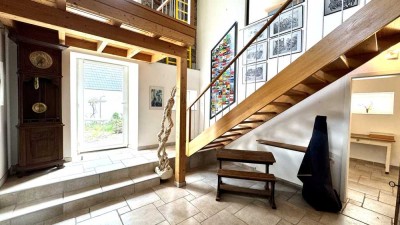 Einzigartiges Zweifamilienhaus mit historischem Charme - Ihr neues, komplett modernisiertes Zuhause!