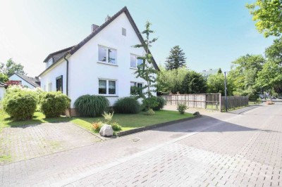 Aktionspreis! Gepflegtes 4-Familienhaus in guter Lage von Gütersloh mit 2 Garagen und Garten